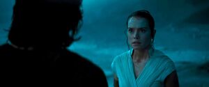 Ben reunites with Rey in the throne room.