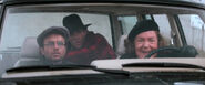 Jake and his family evading the police when they arrive at Cannon Beach.