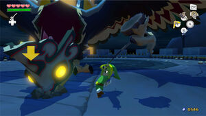 Link preparing to smash the Helmaroc King's mask with the Skull Hammer.