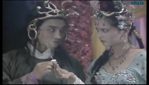 The Nine Headed Bug and his wife, the Wansheng Dragon Princess.