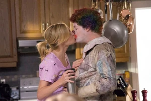 Kent kissing his wife Meg