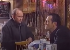 Phil Mitchell clashing with Grant's fellow adversary David Wicks.
