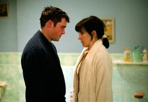 Trevor prepares to attack Little Mo after telling her that he intends to "teach her a lesson that she will never forget" (December 2001).
