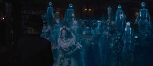 Constance and the other ghosts confronting Father Kent.