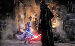 Kylo and Rey face each other during a Force-bond connection.