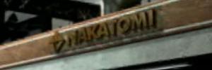 A plaque with Nakatomi Corporation's official public logo on it.