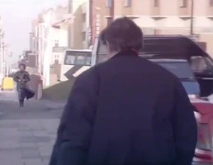 Alan about to encounter Rita in Blackpool after finding out that she has left The Strand Hotel.