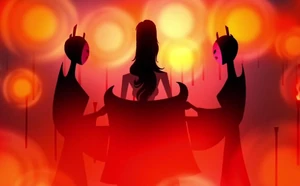 The High Priestess putting her clothes on with the help of 2 cult members.