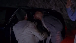 Charlie beating T. Paul up