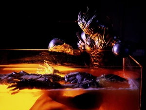 Arch Orphnoch held inside a stasis tank by Saeko Kageyama until it fully recovers.