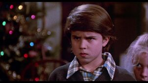 Ricky as a boy at the end of the film.