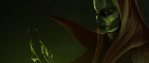 Talzin begins to subject the tiny effigy of Dooku to her curses.