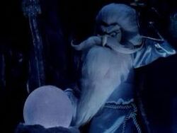 Winterbolt learning about Santa Claus through his crystal ball.