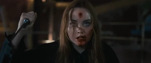 Quinn's death as she gets shot straight into the skull by Sam after foolishly making an attempt to attack her with a knife in a gunfight, thus finally putting an end to her and what Gale mentioned earlier.