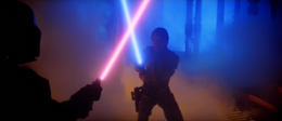 With the Sith Lord momentarily stunned, Skywalker used the Force to summon his lightsaber to his hand re-engaging Vader and locked blades with him again.