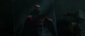 Maul laying unconscious on the font.