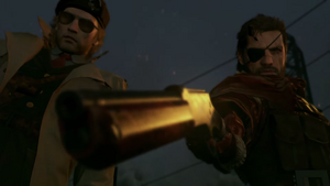 Venom Snake and Miller standing over Skull Face, before blowing off his limbs.