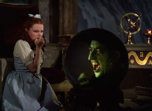 Witch taunting Dorothy.