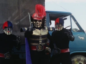 Armored Knight with two of his combatants.