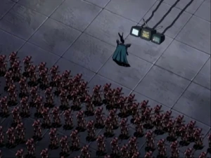 Black Narcissus and his army listening to the other commanders through a TV set.