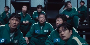 Team O hearing about eliminated players after the bathroom fight.