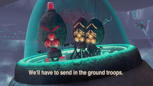 Melvin and Tina with one of the troop leader aliens, with the latter saying he will send in ground troops.
