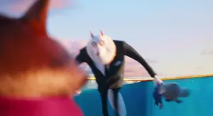 Jimmy carrying Buster.