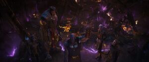 Thanos prepring to teleport Maw and the other Black Order members out of the Statesman.