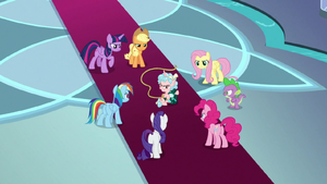 Mane 6 and Spike surrounding Cozy