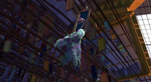 As Sulley hangs on for dear life, Randall threatens to end it.