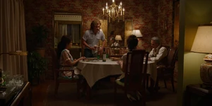 Billy rejoining the Holloways at the dinner table.