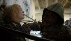 Ragman attacks the Amertek CEO with his tendrils