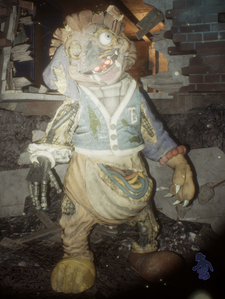 The Mimic wearing a decrepit lion costume.