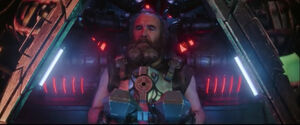The Buyer in his armored mech suit.