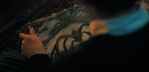 Henry Creel drawing the first sketch of the "ideal predator he always born to be", based on black-widow spiders.