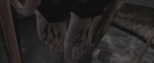 The numbers 11/21 carved on the feet of Walter's corpse.