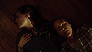 Cam cuddles up to Sarah and tells her about his obsession with her.