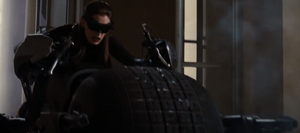 Catwoman shortly after killing her former associate Bane and saving Batman in the process.
