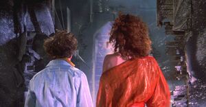 Vinz Clortho and Zuul walk towards the stairway to the rootop as they prepare for the arrival of Gozer.