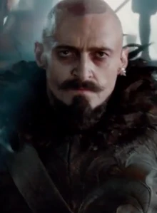 Blackbeard angry after losing his wig.