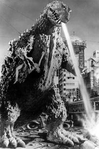 Concept art of Godzilla firing his atomic breath. (NOTE: A fainted woman can be seen hanging on Godzilla's hand.)