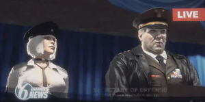 Hemlock making his conference speech, accompanied by Hilde.