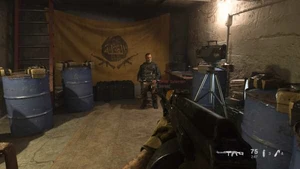 The-Wolf-bomb.jpg (17 KB) The Wolf armed with a bomb vest, being confronted by "Alex" and Farah Karim.