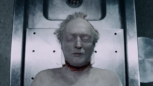 John's corpse, shortly before his autopsy.