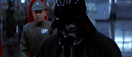 Darth Vader bows as the Emperor arrives.