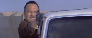 Jack Travis 5.png (199 KB) Travis trying to shoot at Martin Riggs.