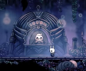 Millibelle sitting at her "bank".