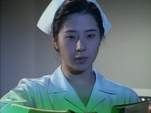 Yanimi in disguise as a nurse.