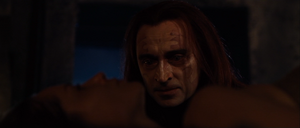 Durza holding Arya captive.
