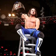 AJ Styles reclaiming his title after beating Ambrose in a TLC match.